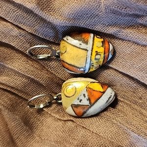 Artisan created ceramic earrings on stainless steel leverbacks.